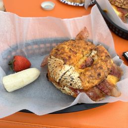 a bagel and a strawberry