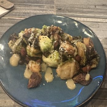 Rumcow - Charred Brussel sprouts - Cocktail Bars Near Me - Wilmington, North Carolina Rumcow - Charred Brussel sprouts - Cocktail Bars Near Me - Wilmington, North Carolina