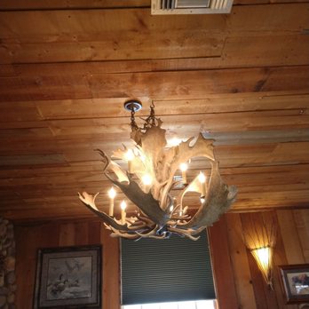 Janet's Montana Cafe - Antler chandelier in the dining room - American Near Me - Alpine, California Janet's Montana Cafe - Antler chandelier in the dining room - American Near Me - Alpine, California