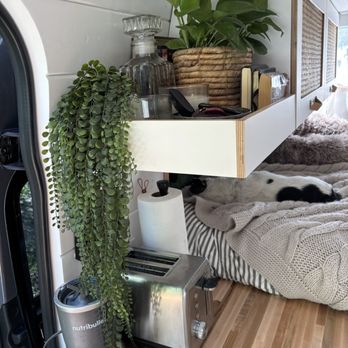 Boho Camper Vans - Cute little bookshelf - RV Rental Near Me - Tempe, Arizona