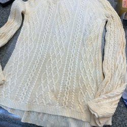 David's Dry Cleaners - Front of ladies cashmere sweater stained by David's Drycleaning