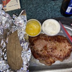 Phoenix Grill & Bar - Steak cooked to liking, baked potato was moist. Beer was crisp.