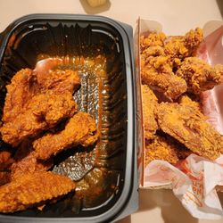 Popeyes Louisiana Kitchen - Signature Hot Wings Sauce and Ghost Pepper chicken.