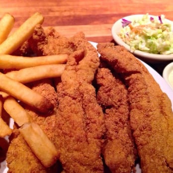 Cheddar's Scratch Kitchen - Fried catfish. It comes with fries, coleslaw, and tartar sauce. It's good but not as good as my Grandmothers - American Near Me - Independence, Missouri