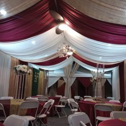 MJ Magical Events - Backdrop with greenery and side curtains .