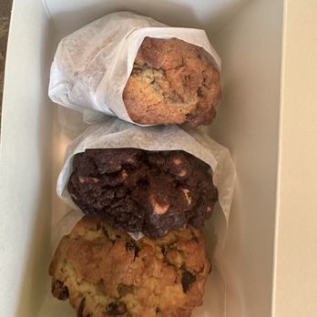 Levain Bakery - Top to bottom: walnut chocolate chip, chocolate peanut butter, and oatmeal raisin - Bakeries Near Me - Los Angeles, California Levain Bakery - Top to bottom: walnut chocolate chip, chocolate peanut butter, and oatmeal raisin - Bakeries Near Me - Los Angeles, California