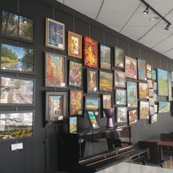 Buvez - Gallery Wall has a different display every month. Open Mic Night Thursday 7-10.