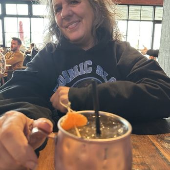Finney's Crafthouse - Stevenson Ranch - My friend having some type of mule drink . It was very good . - New American Near Me - Stevenson Ranch, California