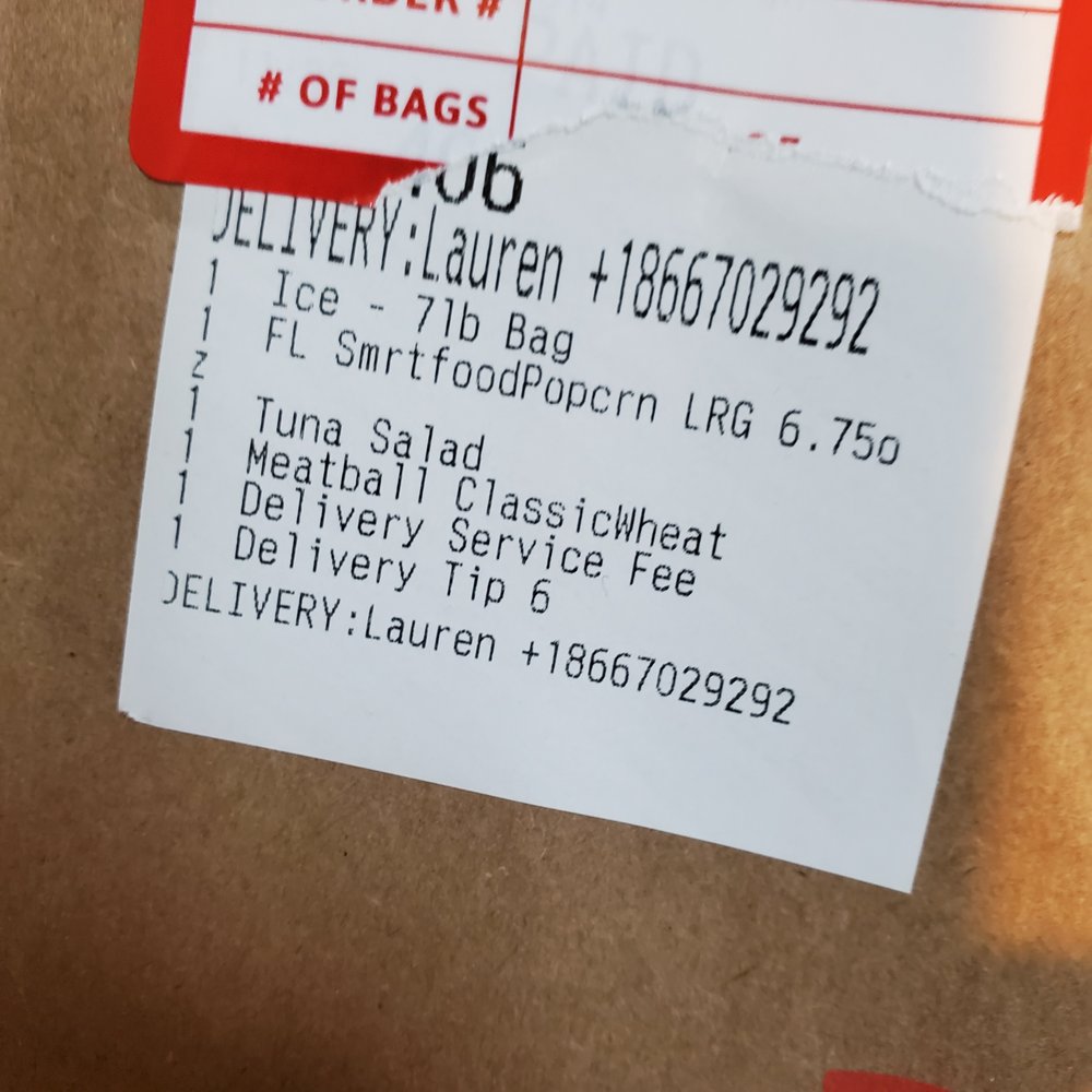 a bag of food with a price tag