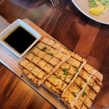 Grappa - House Focaccia - Mediterranean Near Me - Seattle, Washington Grappa - House Focaccia - Mediterranean Near Me - Seattle, Washington