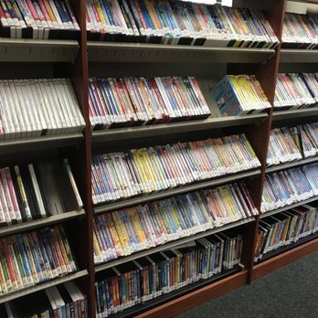 Parkland Library - Wall of children's DVDs - Libraries Near Me - Parkland, Florida