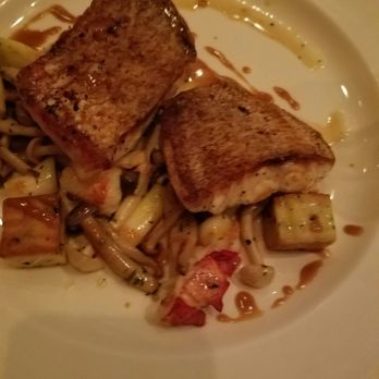 Eleven - Red Snapper with assorted root vegetables, mushrooms and potato gnocchi. Gnocchi reminded us more more of a potato casserole. - New American Near Me - Pittsburgh, Pennsylvania