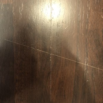 Material Specialist - a closeup of a wood floor - General Contractors Near Me - Los Alamitos, California Material Specialist - a closeup of a wood floor - General Contractors Near Me - Los Alamitos, California
