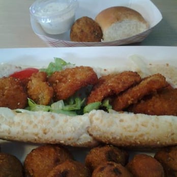 Shrimp N Stuff - Shrimp Po'Boy, hush puppies and a boudin ball...freaking delicious!! - Seafood Near Me - Galveston, Texas Shrimp N Stuff - Shrimp Po'Boy, hush puppies and a boudin ball...freaking delicious!! - Seafood Near Me - Galveston, Texas