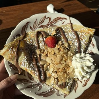Seven Swans Creperie - The Paris - classic Nutella, banana and strawberry crepe topped with whipped cream and slivered almonds - Creperies Near Me - Milwaukee, Wisconsin Seven Swans Creperie - The Paris - classic Nutella, banana and strawberry crepe topped with whipped cream and slivered almonds - Creperies Near Me - Milwaukee, Wisconsin
