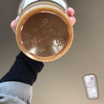 City Brew - a person holding a jar of coffee - Coffee & Tea Near Me - Miles City, Montana City Brew - a person holding a jar of coffee - Coffee & Tea Near Me - Miles City, Montana