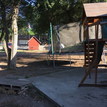 ProTech Landscaping - a play area with a swing set - Landscaping Near Me ProTech Landscaping - a play area with a swing set - Landscaping Near Me