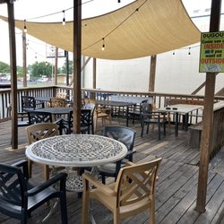 Dugout Bar & Grill - Patio ambience.  Indoor dining has TV's.