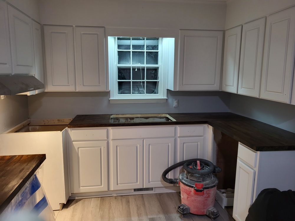 Slide of Bryans Do It All