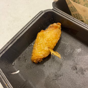 Wingstop - When I order my food today at 2:50 PM, get my food from Wingstop and I see this on my wing this is really nasty Wingstop! - Chicken Wings Near Me - Vacaville, California