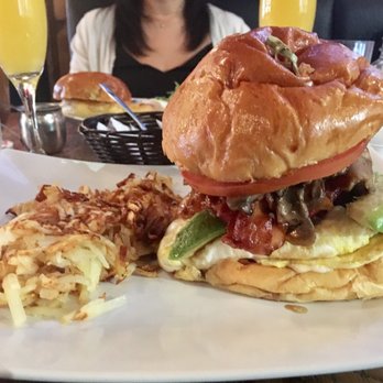 Notre-Bœuf-de-Grâce - Introducing the Breakfast Sandwich! (Eggs, bacon, caramelized onions, beef salami, tomatoes and lettuce) I added avocado. - Burgers Near Me - Montreal, Quebec