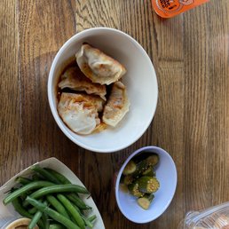 Gomae green beans, soy pickled cucumbers, pork and nuts dumplings Gomae green beans, soy pickled cucumbers, pork and nuts dumplings