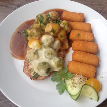 Steak Brothers - Pork with Brussels sprouts and mini mashed potato things - Steakhouses Near Me - Goch, NW