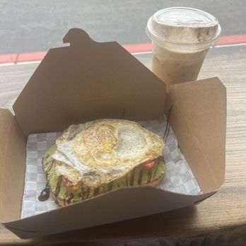 Raised By Lions Coffee - Iced Cinnamon Toast Latte & Avocado Toast with an over medium egg - Coffee & Tea Near Me - Tustin, California Raised By Lions Coffee - Iced Cinnamon Toast Latte & Avocado Toast with an over medium egg - Coffee & Tea Near Me - Tustin, California