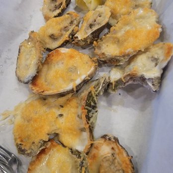 Shuck Me Denton - Garlic and cheese grilled oysters - Seafood Near Me - Denton, Texas Shuck Me Denton - Garlic and cheese grilled oysters - Seafood Near Me - Denton, Texas