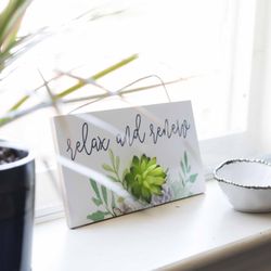 True Healing Massage - Relax and Renew, by a window in the studio that has a beautiful view of the river.
