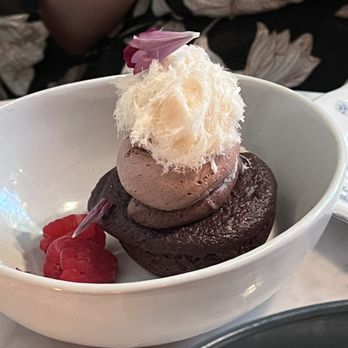 NaKorn - Vegan Chocolate cake with cotton candy on top. - Thai Near Me - Evanston, Illinois