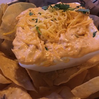 The Yard - Buffalo chicken dip has quite a kick. Served with tortilla chips. - Gastropubs Near Me - Pittsburgh, Pennsylvania The Yard - Buffalo chicken dip has quite a kick. Served with tortilla chips. - Gastropubs Near Me - Pittsburgh, Pennsylvania