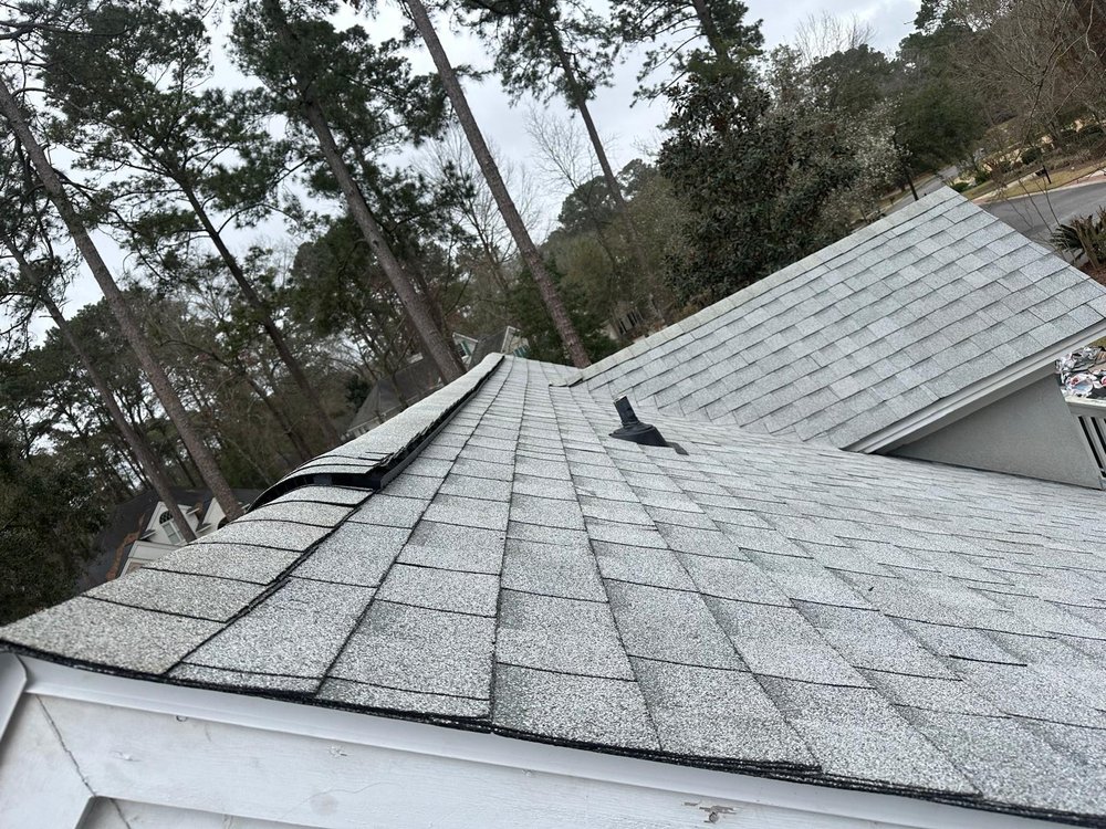 Slide of Palma's Roofing Experts