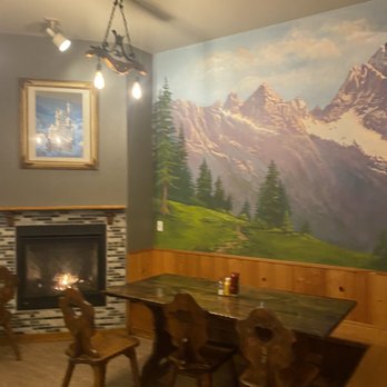 Ludwig's - Awesome wall mural with mountains. We had a strong debate over whether the painting above the fireplace is a castle or a palace! - German Near Me - Leavenworth, Washington Ludwig's - Awesome wall mural with mountains. We had a strong debate over whether the painting above the fireplace is a castle or a palace! - German Near Me - Leavenworth, Washington