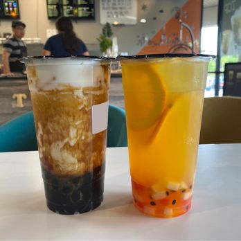 Tiger Tea - Left: brown sugar milk tea w tapioca balls Right: passion fruit green tea with rainbow jelly - Bubble Tea Near Me - Winston-Salem, North Carolina Tiger Tea - Left: brown sugar milk tea w tapioca balls Right: passion fruit green tea with rainbow jelly - Bubble Tea Near Me - Winston-Salem, North Carolina