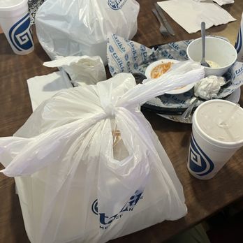 Taziki's Mediterranean Cafe - Aftermath of a party of four. Most of us had something to take home plus I grabbed a baklava. 02AUG26 - Greek Near Me - San Marcos, Texas Taziki's Mediterranean Cafe - Aftermath of a party of four. Most of us had something to take home plus I grabbed a baklava. 02AUG26 - Greek Near Me - San Marcos, Texas