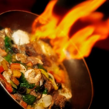 Edinboro Hotel - a pan of food being cooked - American Near Me - Edinboro, Pennsylvania Edinboro Hotel - a pan of food being cooked - American Near Me - Edinboro, Pennsylvania