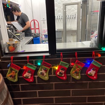 Side Project Pizza - a man preparing food - Breweries Near Me - Maplewood, Missouri