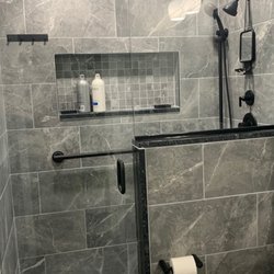 Burton Carpet Shoppe - Bathroom/shower tile installation in a residential home.