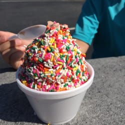 Swirls & Scoops - Small soft serve chocolate with sprinkles
