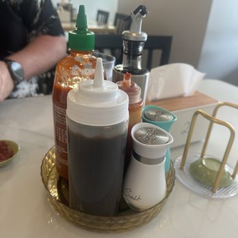Saigon 1 Pho - Condiments on table - Vietnamese Near Me - Virginia Beach, Virginia Saigon 1 Pho - Condiments on table - Vietnamese Near Me - Virginia Beach, Virginia