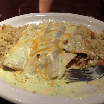 Gringo's Mexican Kitchen - Sour cream enchiladas with double rice side. - Mexican Near Me - Spring, Texas Gringo's Mexican Kitchen - Sour cream enchiladas with double rice side. - Mexican Near Me - Spring, Texas