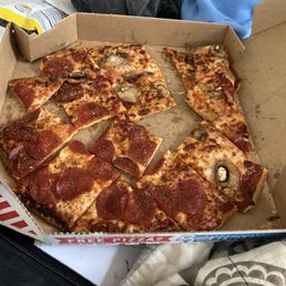A mess of a cold pizza A mess of a cold pizza