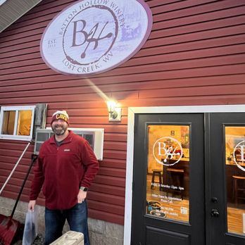 Batton Hollow Winery - a man standing in front of a building - Wine Tasting Room Near Me - Lost Creek, West Virginia