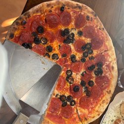Block North’s Locker room - Custom Pizza. Pepperoni and olives.