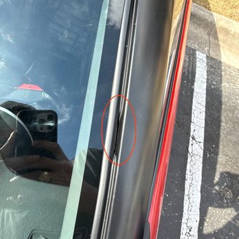 Pmc Auto Glass - The weather seal is dipped and creased, showing poor installation. - Auto Glass Services Near Me Pmc Auto Glass - The weather seal is dipped and creased, showing poor installation. - Auto Glass Services Near Me