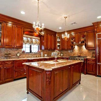 Stanislaus Construction - a large kitchen with a center island - General Contractors Near Me Stanislaus Construction - a large kitchen with a center island - General Contractors Near Me