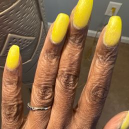 My nails filed uneven and crooked and a sloppy SNS nail application. This is what the manicurist called "done".