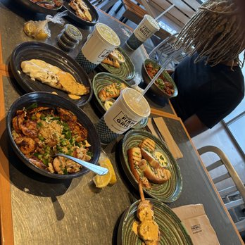 California Fish Grill - Rapper BTD Pudi settling in to DEVOUR all this good food! Let's hope he makes a song about it - Seafood Near Me - Phoenix, Arizona