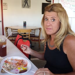 My wife enjoying the home made potato  salad
